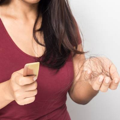 Breastfeeding & Postpartum Hair Loss: Everything You Need to Know